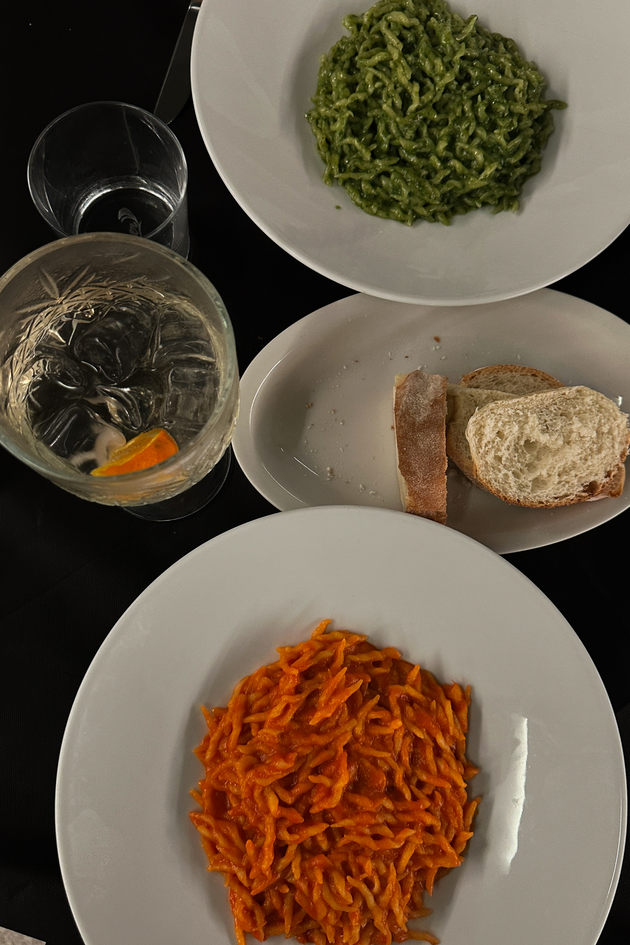 Traditional Italian pasta dishes with pesto and tomato sauce served at restaurant Clipper in Bogliasco, Liguria
