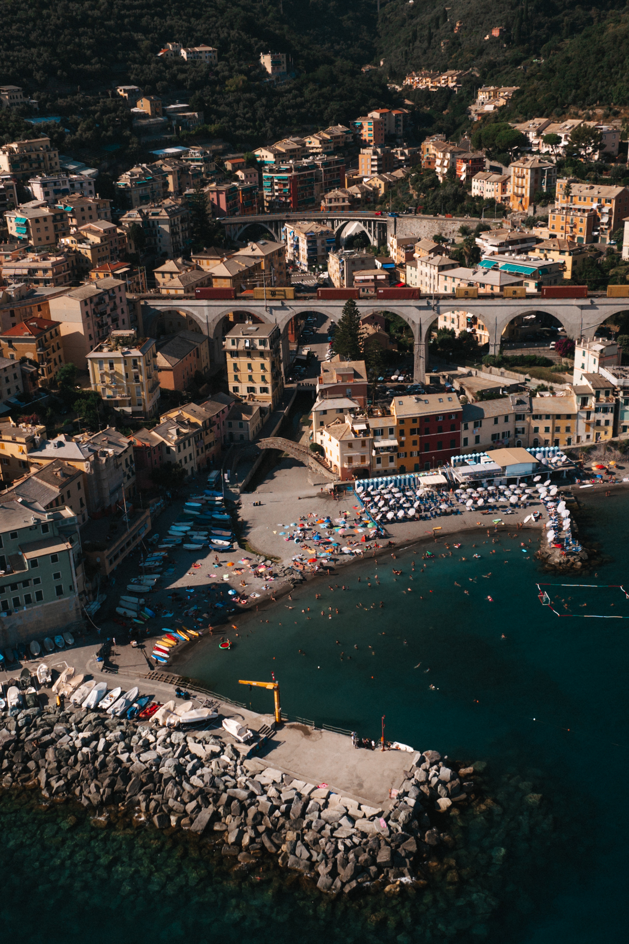 Aerial view of Bogliasco beach and colorful houses by the sea in Liguria, Italy