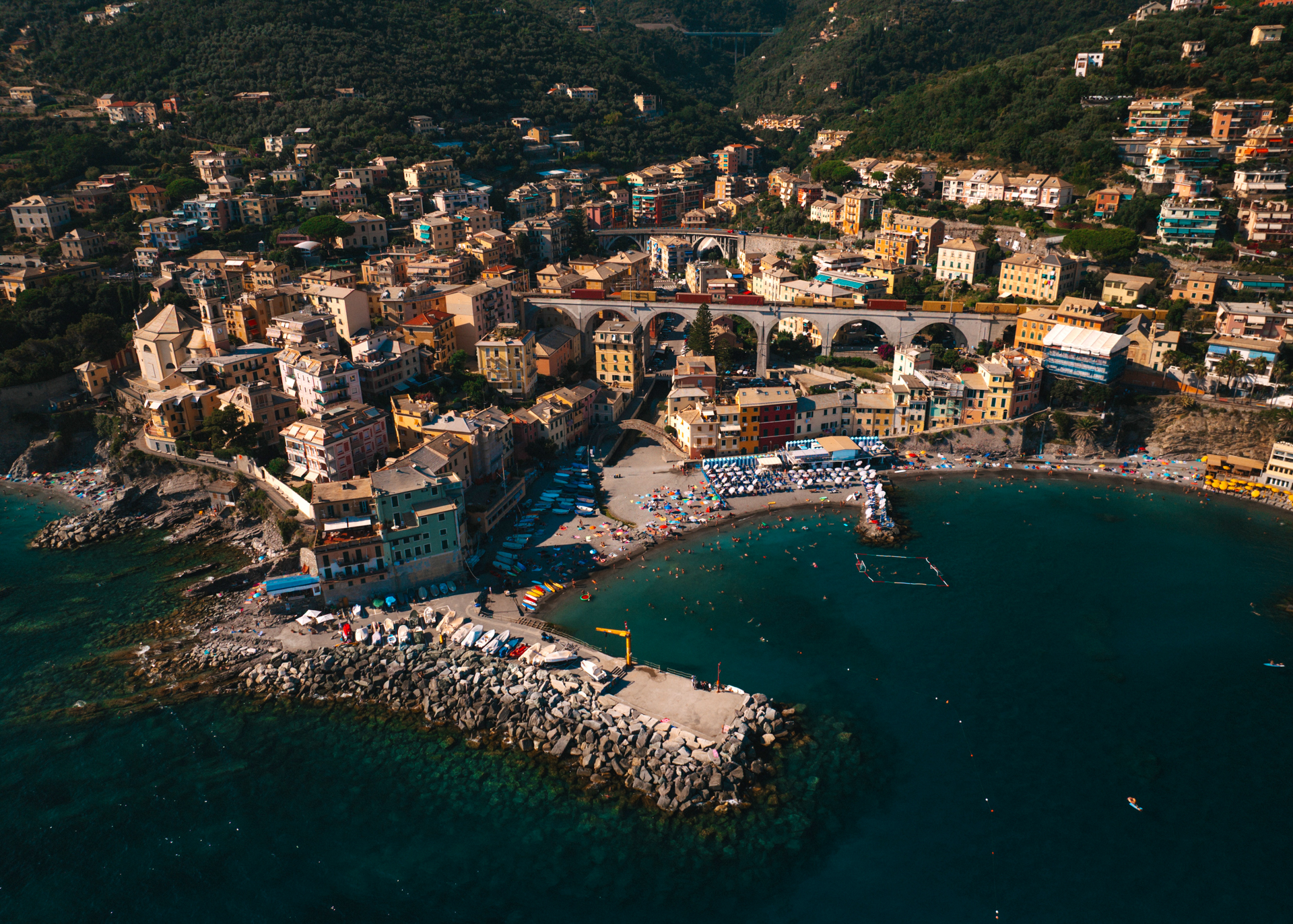 Aerial view of Bogliasco beach and colorful houses by the sea in Liguria, Italy