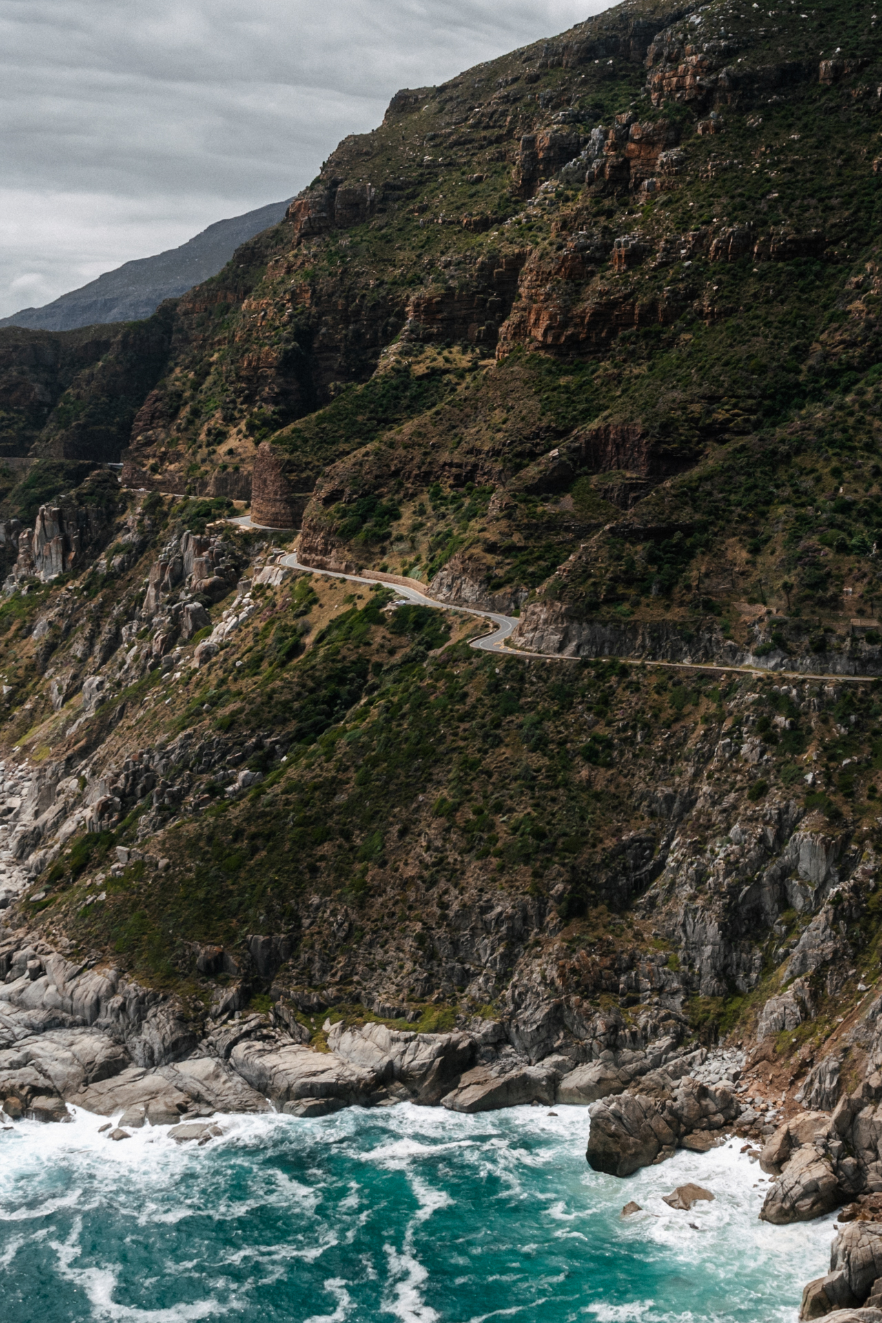 Chapman's Peak A winding coastal road carved into rugged cliffs along Chapman’s Peak Drive in Cape Town.