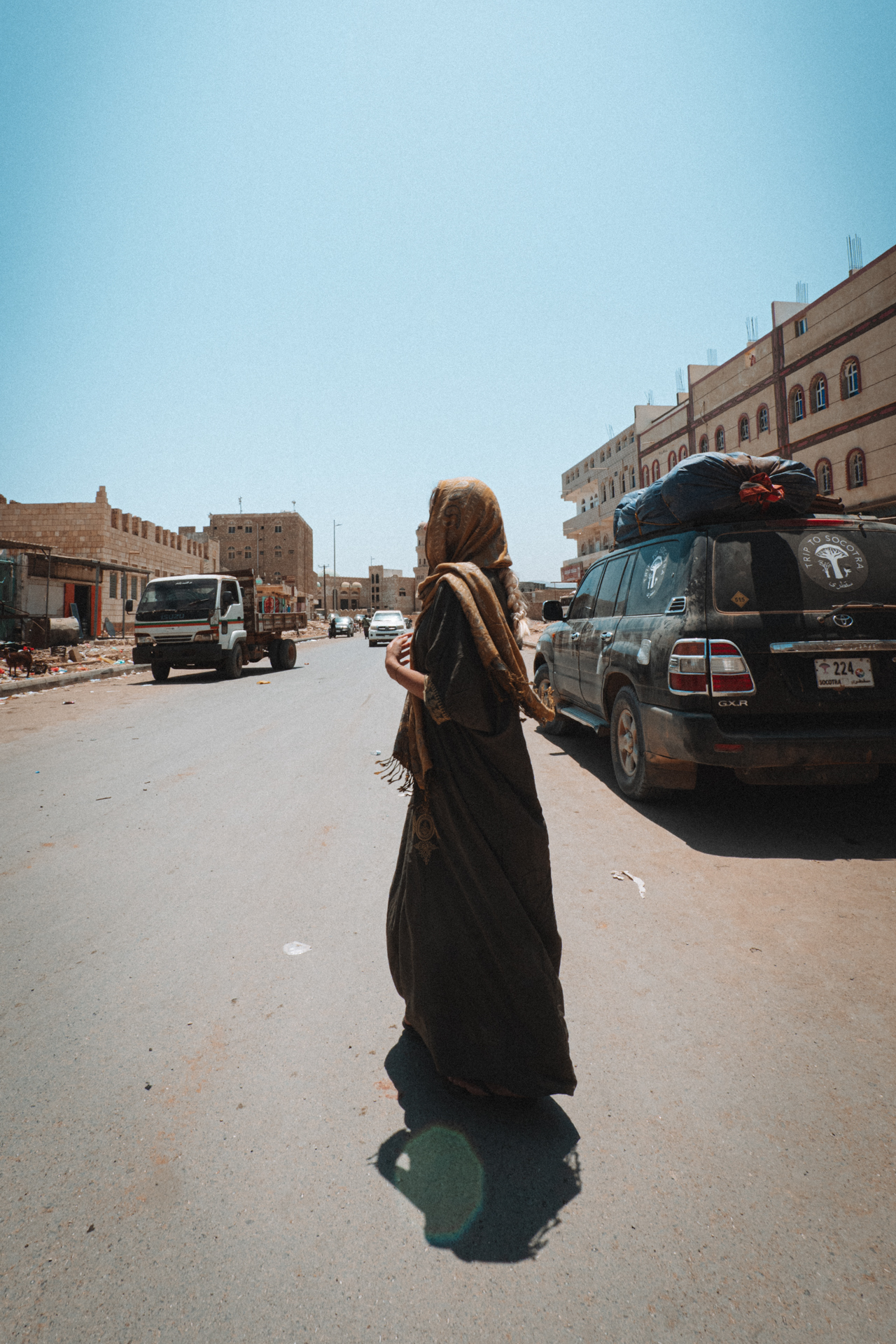 Hadibo Woman in traditional dress walking on a street in Hadibo, Socotra’s main town.