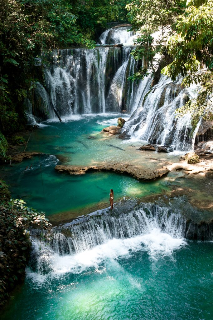 Sulawesi Piala waterfall with turquoise pools surrounded by lush jungle in Luwuk, Sulawesi.